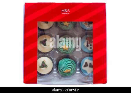 Box of M&S 9 mini festive cupcakes isolated on white background - ideal for Christmas Xmas Stock Photo