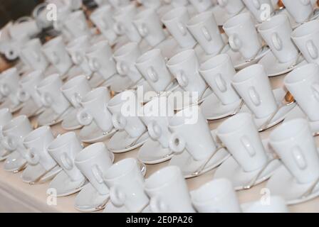 milan - 10/20/2020: withe coffee cups lined up for catering Stock Photo