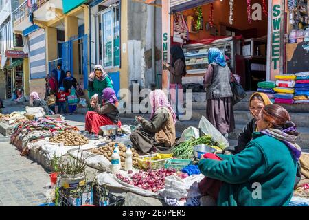 Women selling vegetables in the street market in the  Leh City, Ladakh, Jammu and  Kashmir Stock Photo