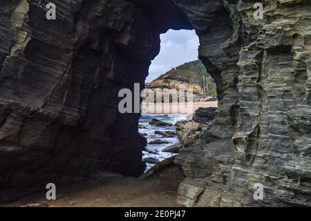 Hole in the wall natural rock formation at Thompsons bay beach ballito South Africa Stock Photo