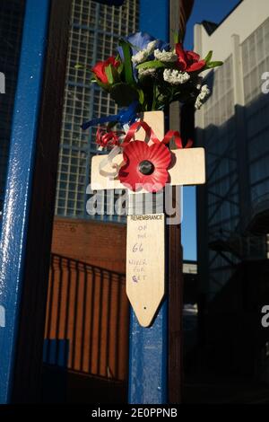 Glasgow, UK, 2 January 2021. Supporters of Rangers Football Club tie scarves on the club's stadium gate, in memory of those 66 fans who lost their life in the Ibrox Stadium disaster which happened 50-years ago today on 2nd January 1971. The anniversary falls on the day that Rangers FC plays their rivals Celtic FC, at home, in a League game. Photo: JeremyS utton-Hibbert/Alamy Live News. Stock Photo