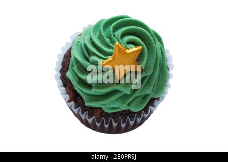 Christmas tree with gold star cupcake cup cake from box of M&S 9 mini festive cupcakes isolated on white background - ideal for Christmas Xmas Stock Photo