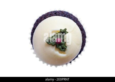 Christmas pudding cupcake cup cake from box of M&S 9 mini festive cupcakes isolated on white background - ideal for Christmas Xmas Stock Photo