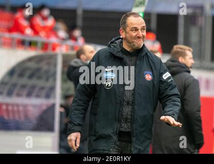 Heidenheim, Germany. 02nd Jan, 2021. Football: 2. Bundesliga, 1. FC Heidenheim - 1. FC Nürnberg, Matchday 14 at Voith Arena. Heidenheim's coach Frank Schmidt reacts on the sidelines. Credit: Stefan Puchner/dpa - IMPORTANT NOTE: In accordance with the regulations of the DFL Deutsche Fußball Liga and/or the DFB Deutscher Fußball-Bund, it is prohibited to use or have used photographs taken in the stadium and/or of the match in the form of sequence pictures and/or video-like photo series./dpa/Alamy Live News Stock Photo
