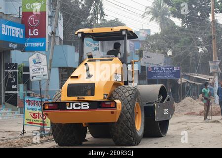 JCB - Road Roller.Dinajpur , Bangladesh. December 06,2020.Road construction work Stock Photo