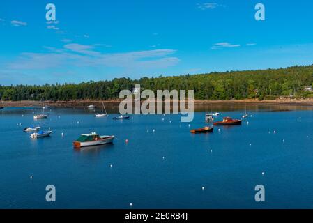 Seal Harbor, Maine, US -- Sept 22, 2016. Small boats are anchored in deep blue harbor waters on a crisp Autumn morning. Editorial Use Only. Stock Photo