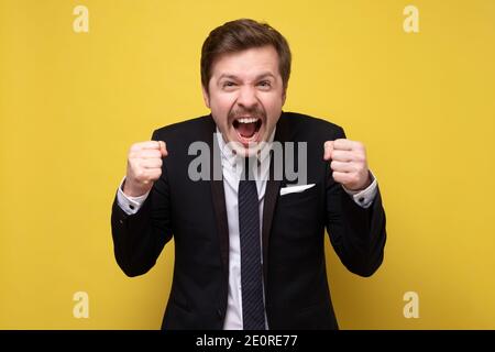 Male facial expression of winning the lottery. Man screaming and ...