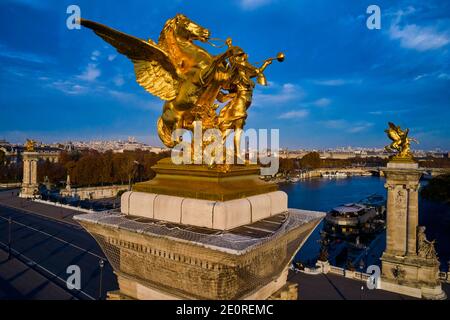 France, Paris, Alexandre III bridge, sculpture by Leopold Steiner representing the Fame of the War accompanied by Pegasus Stock Photo