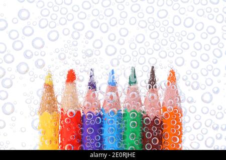 Colored pencils in air bubbles Stock Photo