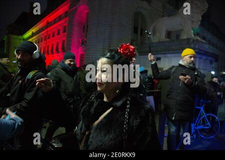 A woman takes part in an anti-lockdown protest in central London on New Year's Eve. — 31. December 2020, England, London, UK