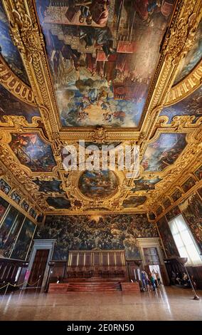 magnificent Hall of the Great Council (Sala del Maggior Consiglio) with longest canvas painting in the world, Il Paradiso of Tintoretto, Doge's Palace Stock Photo