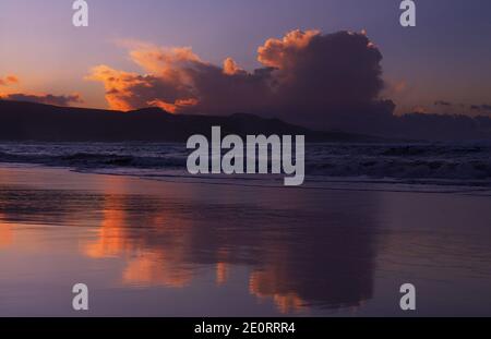 Beautiful sunset over Las Canteras beach in Las Palmas de Gran Canaria Stock Photo