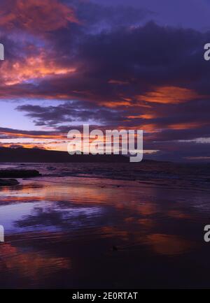 Beautiful sunset over Las Canteras beach in Las Palmas de Gran Canaria Stock Photo