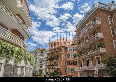 Living inside the Roman Forum in Rome. House building exterior facade with windows and balconies in Parioli district, Rome, Italy Stock Photo
