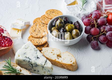 Assortment of cheese and meat appetizers set, on white background Stock Photo
