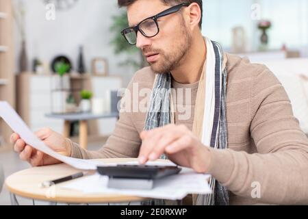 man doing his accounting financial adviser working Stock Photo