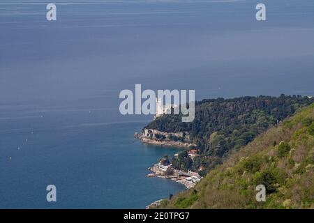 View From The Napoleonica To The Miramare Castle Built On A Cliff Near Trieste In The 19th Century Stock Photo