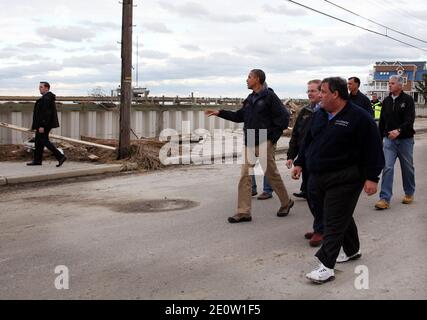 Governor Chris Christie and President Barack Obama visit with homeowners whose houses suffered damage from Hurricane Sandy in Brigantine, NJ, USA, on Wednesday, Oct. 31, 2012. Photo by Tim Larsen/Governor's Office/ABACAPRESS.COM Stock Photo