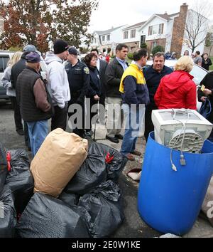 Governor Chris Christie and Lt. Governor Kim Guadagno visit residents and tour flood damaged areas in Moonachie, NJ, USA, on Thursday, Nov. 1, 2012. Photo by Tim Larsen/Governor's Office/ABACAPRESS.COM Stock Photo