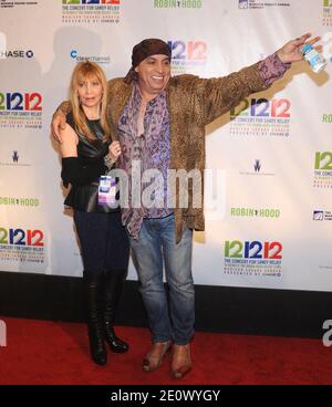 Steven Van Zandt and Maureen Van Zandt in the press room during '12-12-12' The Concert for Sandy Relief to benefit the Robin Hood Relief Fund presented by The Madison Square Garden Company and The Weinstein Company at the Madison Square Garden in New York City, NY, USA on December 12, 2012. Nearly 2 billion people have access to the benefit concert via television, radio and the internet. Photo by Brad Barket/ABACAPRESS.COM Stock Photo