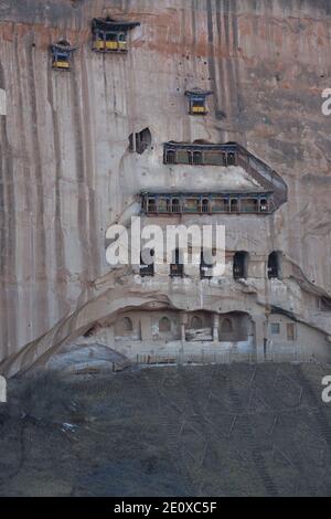 Matisi Temple - Grottos in the Cliff