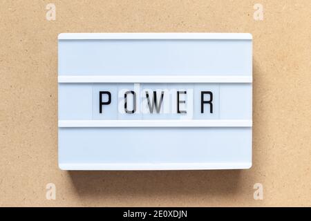White lightbox with word power on wood background Stock Photo