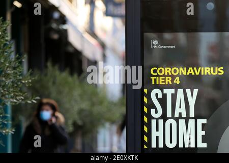 London, UK. 30th Dec, 2020. A 'Stay Home' sign seen in London.According to the government figures, on 2 January 2021, the UK has recorded 57,725 coronavirus cases and 74,570 people have died from the virus Credit: Dinendra Haria/SOPA Images/ZUMA Wire/Alamy Live News Stock Photo
