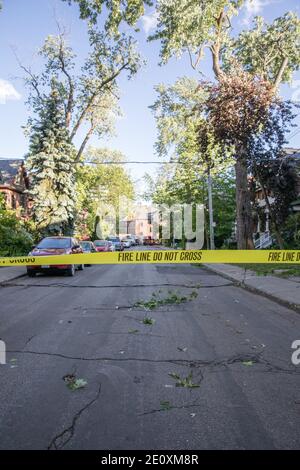 Toronto, Ontario, Canada. 13th June, 2018. A closed off neighbourhood road during the aftermath.A powerful rainstorm hit Toronto leaving 16,500 households across the city without power, pouring into the iconic Eaton Centre mall. No deaths were recorded. Credit: Shawn Goldberg/SOPA Images/ZUMA Wire/Alamy Live News Stock Photo