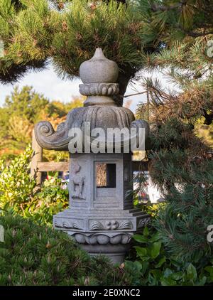 Details of Japanese style stone pagoda in the garden. Travel photo, street view. Stock Photo