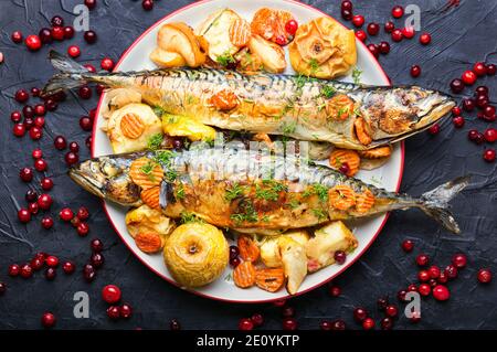 Delicious mackerel or scomber in apples and cranberry Stock Photo