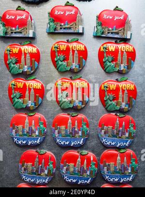 New York City, NY (USA) - 16 November 2019: New York souvenirs, refrigerator magnets and merchandise for sale at a booth in Manhattan Stock Photo