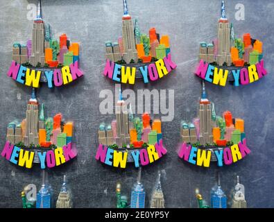 New York City, NY (USA) - 16 November 2019: New York souvenirs, refrigerator magnets and merchandise for sale at a booth in Manhattan Stock Photo