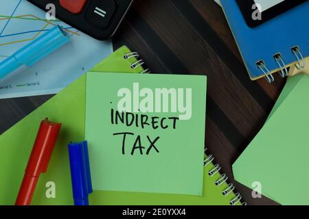 Indirect Tax write on sticky notes isolated on Wooden Table. Business or Finance concept Stock Photo