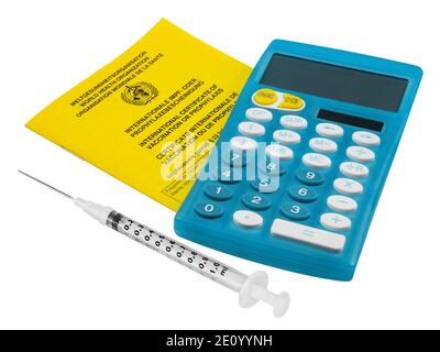 Certificate of vaccination and calculator with injection isolated on white background Stock Photo