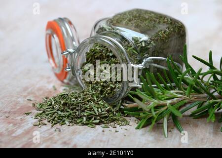 Dried rosemary in glass jar, rosemary branch, Germany, Europe Stock Photo