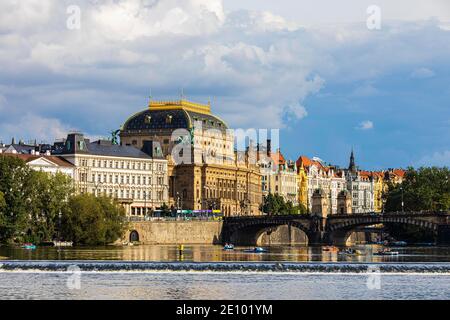 State Opera, historic house facades and the Legions' Bridge over the Vltava River, Prague, Czech Republic, Europe Stock Photo