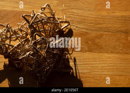 golden wooden stars made for the christmas time as natural background Stock Photo