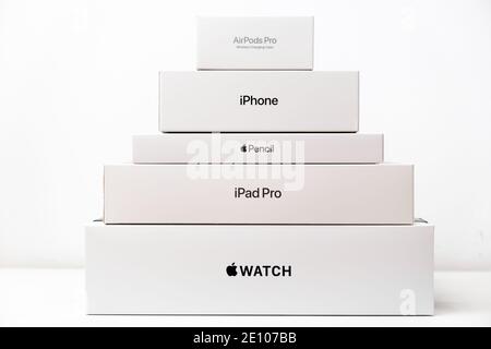 Apple watch, iPad Pro, Apple pencil, iphone, airpods pro pyramid from boxes. Shopping concept. December 2020, San Francisco, USA Stock Photo
