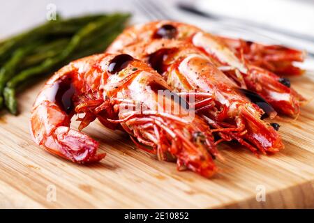 Grilled prawns with asparagus. High quality photo Stock Photo