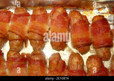 Pigs in Blankets all in a row Stock Photo