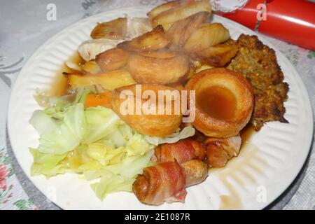 Roast Turkey and vegetables along with sausage meat and yorkshire puddings Stock Photo