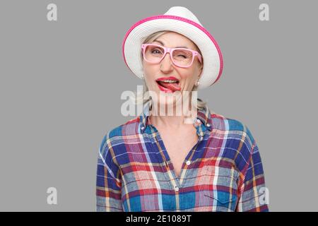 Senior woman winking at camera, portrait, close-up Stock Photo - Alamy