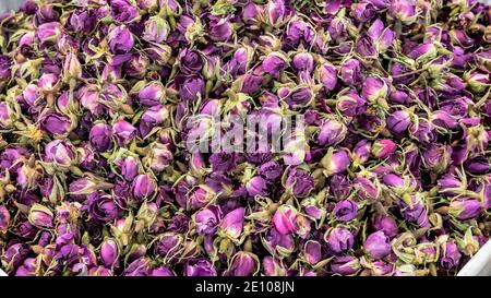 Pile of rose buds sold in a traditional Iranian market, Isfahan Stock Photo
