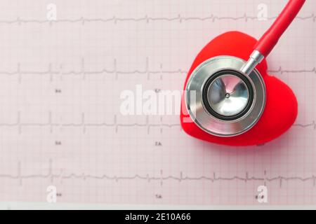 stethoscope and heart on a cardio diagram. Stock Photo