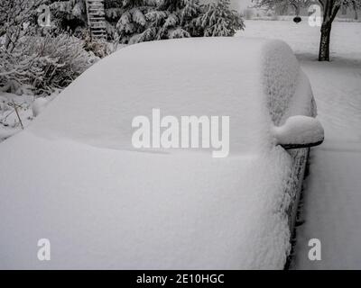 Car is completely covered with snow Stock Photo