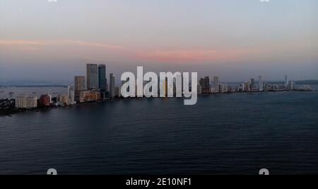 Aerial panorama of Cartagena de Indias Bocagrande financial business district modern architecture skyscraper at sunset in Bolivar Colombia South Ameri Stock Photo