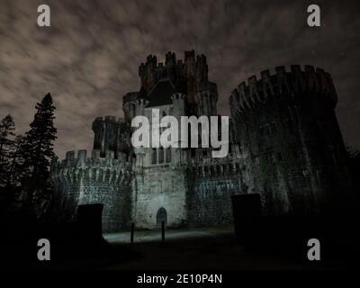 Middle ages medieval castle historical building Castillo de Butron Butroeko Gaztelua illuminated at night in Gatika Biscay Basque Country Spain Europe Stock Photo