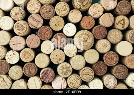 Yerevan, Armenia - July 10, 2017. Background with used wine bottle corkwood caps from different bottles Stock Photo
