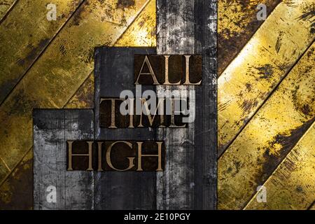All Time High text on grunge textured authentic copper and gold background Stock Photo