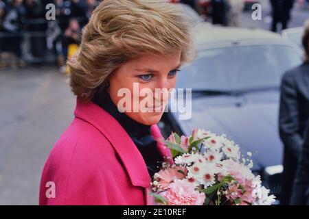 A smiling Diana, Princess of Wales receiving a bouquet of flowers during a visit to the Relate Marriage Guidance Centre in Barnet, north London, 29th November 1988 Stock Photo